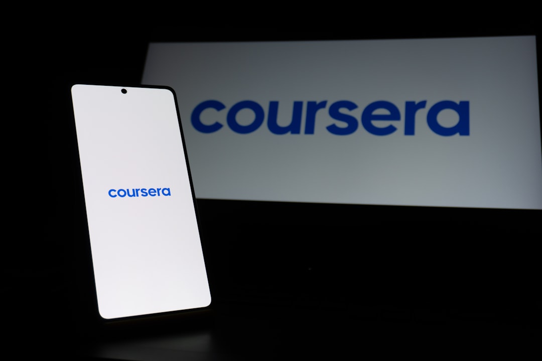 services-02 smartphone-displaying-coursera-logo-next-to-large-logo-ojrjokmyr2k
