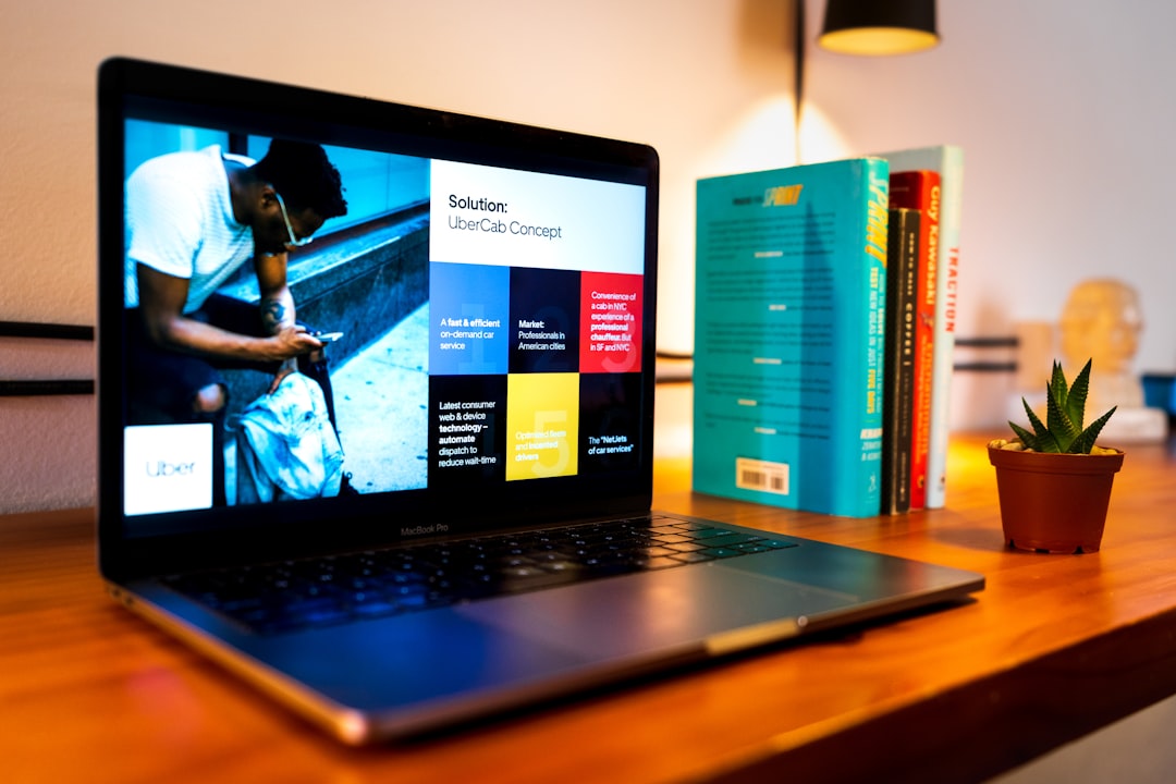 about-01 black-laptop-computer-on-brown-wooden-table-tsbg-h3pc-g